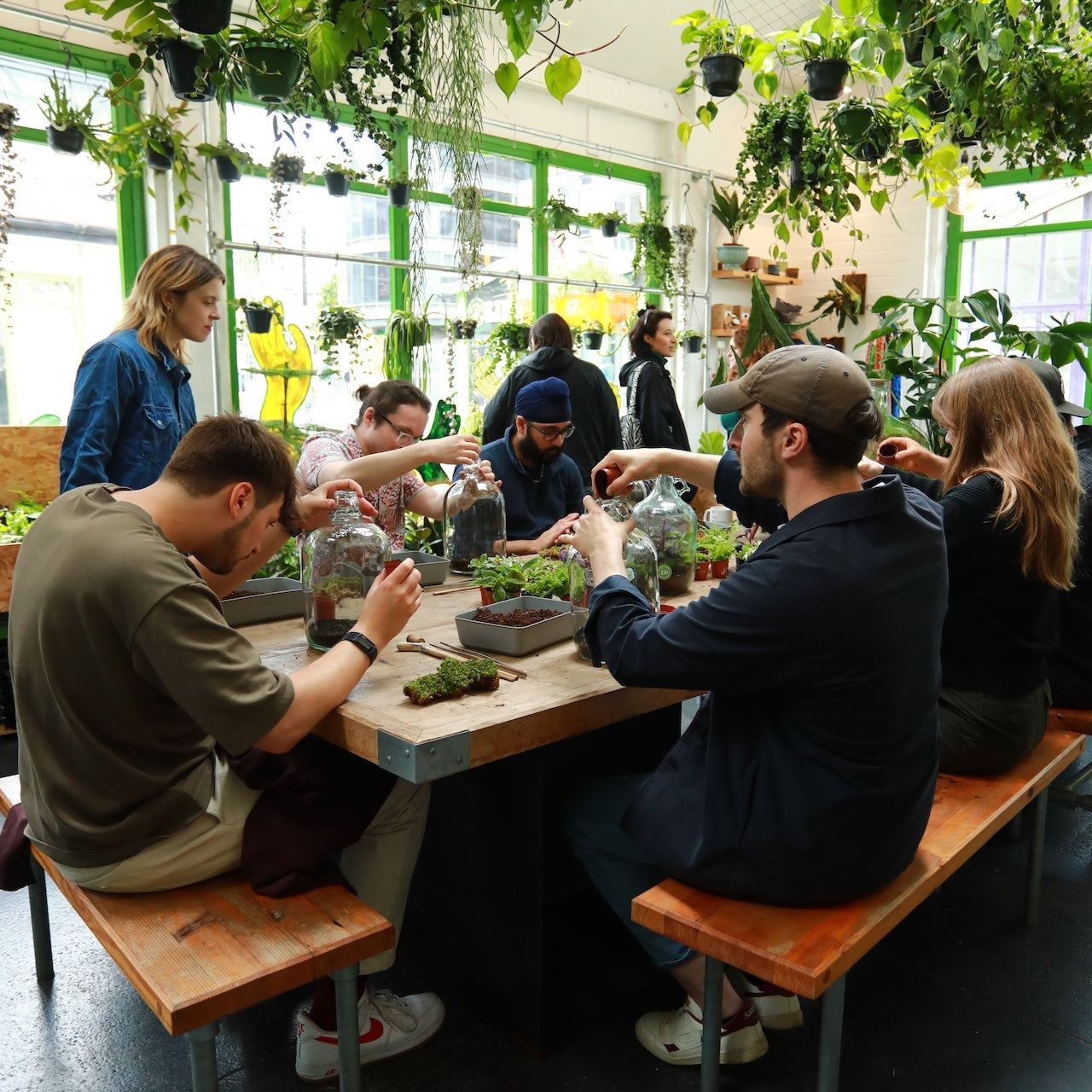 a class of people doing the demijohn workshop